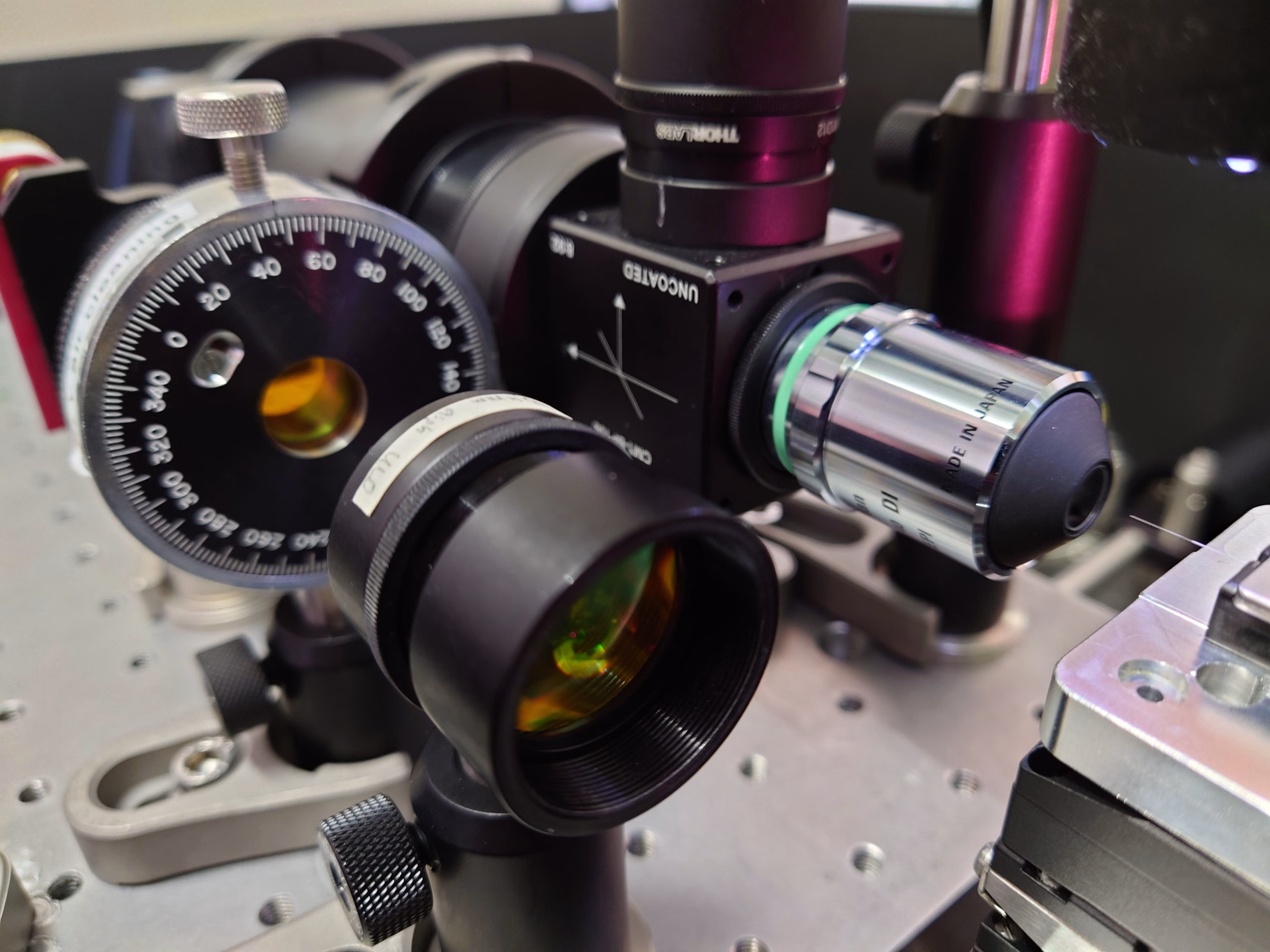 Laboratory optical bench with lenses and mirrors used in MCEAS development
